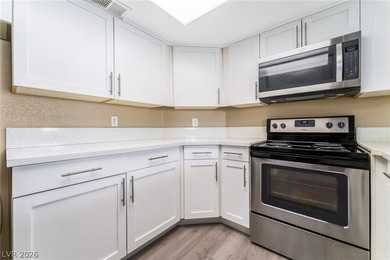 Don't miss this beautifully updated first-floor condo in a very