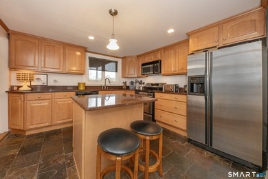 Beautifully maintained 3 bedroom, 2 bath Cape nestled on a quiet - photo 2