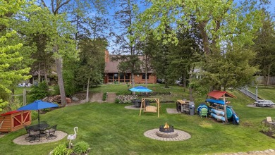 With 65 ft of sand-bottom beach frontage and breathtaking views - photo 3