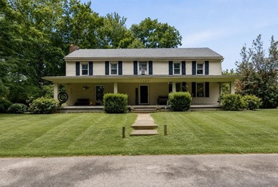 Escape to the peace and charm of country living with this - photo 1