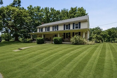 Escape to the peace and charm of country living with this - photo 2