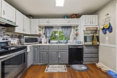 Escape to the peace and charm of country living with this - photo 9