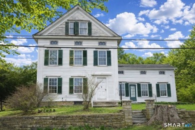 Nestled along a quiet country road in the charming town of - photo 1
