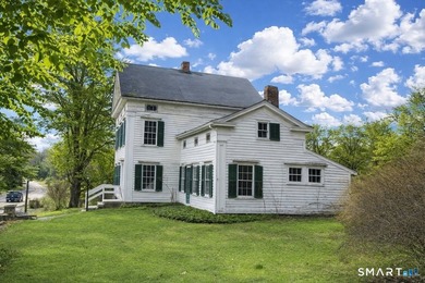 Nestled along a quiet country road in the charming town of - photo 2