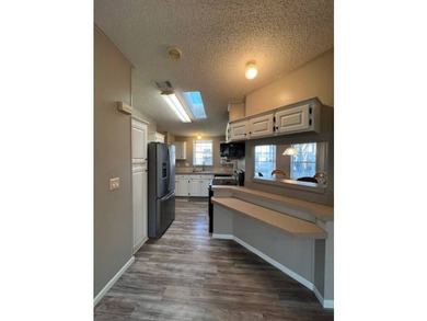 INVESTOR OPPORTUNITY - TENANT IN PLACE THROUGH JULY 2027! Add an - photo 4