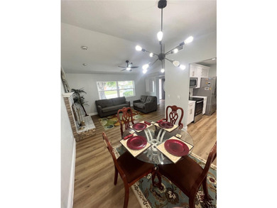 Fully remodeled, this stunning 3-bedroom, 2-bath single-family - photo 4