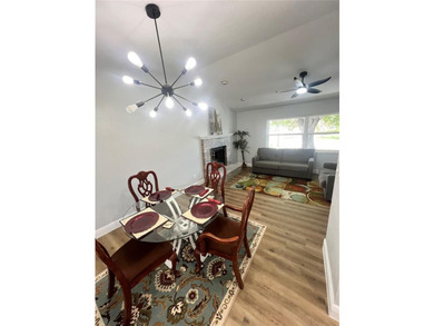 Fully remodeled, this stunning 3-bedroom, 2-bath single-family - photo 5