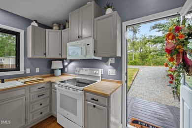 HUGE PRICE IMPROVEMENT!! Exquisite waterfront retreat on the - photo 7