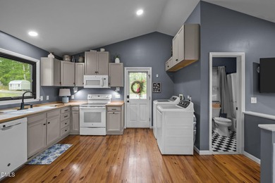 HUGE PRICE IMPROVEMENT!! Exquisite waterfront retreat on the - photo 8