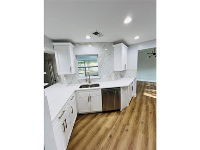 Fully remodeled, this stunning 3-bedroom, 2-bath single-family - photo 10