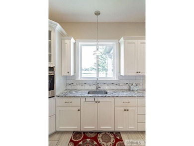 Main-level living at its finest - and yes, your backyard is the - photo 13
