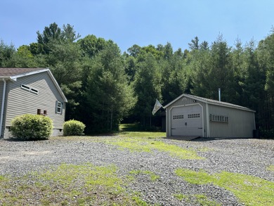 Nestled on a peaceful one-acre parcel in scenic Long Lake, this - photo 17