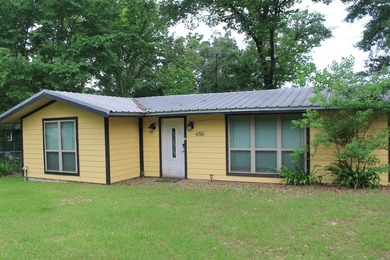 This home is priced to sell. Fully furnished. Open concept - photo 1