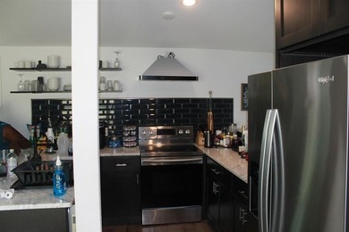 This home is priced to sell. Fully furnished. Open concept - photo 2