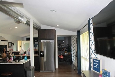 This home is priced to sell. Fully furnished. Open concept - photo 4