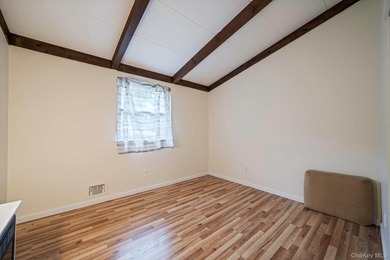 Lovingly maintained three bedroom home featuring an upgraded - photo 11