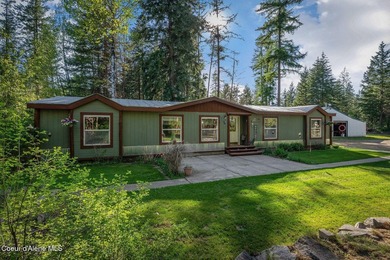 Live the North Idaho Dream on this nearly 20 (19.45), acres with - photo 1