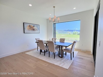 This home perfectly blends luxury with practicality. It offers a - photo 11