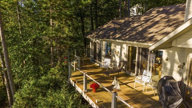 Perched among the whispering pines on Walloon Lake's desirable - photo 12