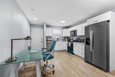 Experience effortless riverfront living at Riverside Condos in - photo 13