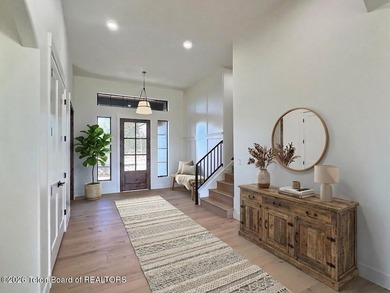This home perfectly blends luxury with practicality. It offers a - photo 13