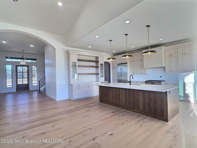 This home perfectly blends luxury with practicality. It offers a - photo 14
