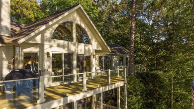 Perched among the whispering pines on Walloon Lake's desirable - photo 15