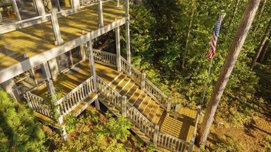 Perched among the whispering pines on Walloon Lake's desirable - photo 16