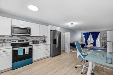 Experience effortless riverfront living at Riverside Condos in - photo 16