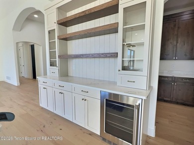 This home perfectly blends luxury with practicality. It offers a - photo 17