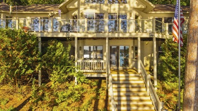 Perched among the whispering pines on Walloon Lake's desirable - photo 18