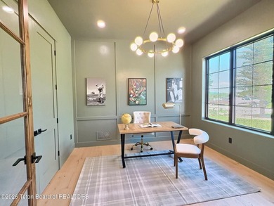 This home perfectly blends luxury with practicality. It offers a - photo 20
