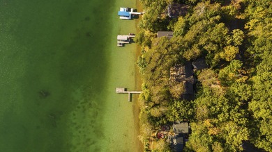 Perched among the whispering pines on Walloon Lake's desirable - photo 23