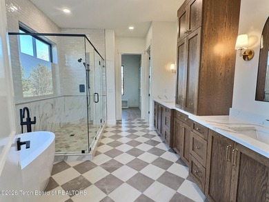 This home perfectly blends luxury with practicality. It offers a - photo 23