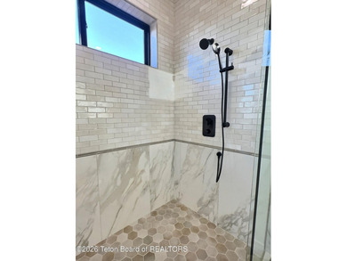 This home perfectly blends luxury with practicality. It offers a - photo 24