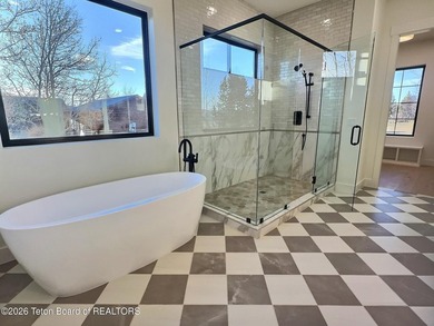 This home perfectly blends luxury with practicality. It offers a - photo 25