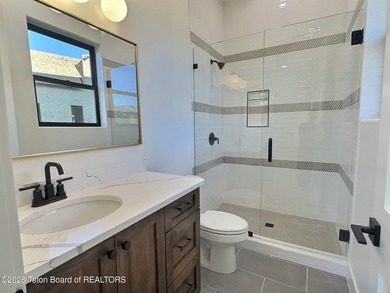 This home perfectly blends luxury with practicality. It offers a - photo 29