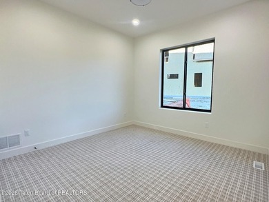 This home perfectly blends luxury with practicality. It offers a - photo 30