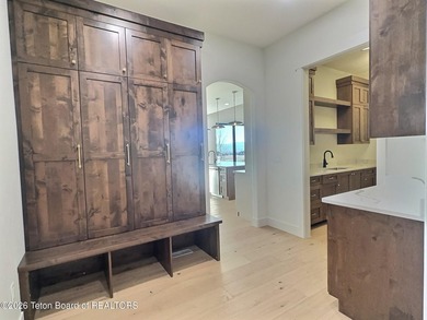 This home perfectly blends luxury with practicality. It offers a - photo 32