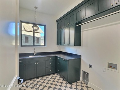 This home perfectly blends luxury with practicality. It offers a - photo 35