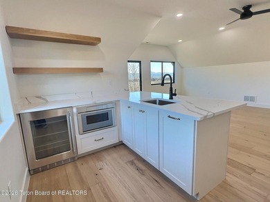 This home perfectly blends luxury with practicality. It offers a - photo 41