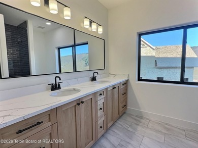 This home perfectly blends luxury with practicality. It offers a - photo 42