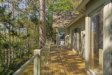 Perched among the whispering pines on Walloon Lake's desirable - photo 59