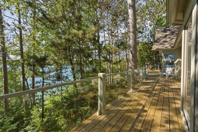 Perched among the whispering pines on Walloon Lake's desirable - photo 60