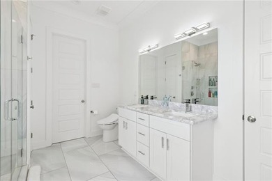 Welcome home to this stunning 2021-built Gentilly residence - photo 10