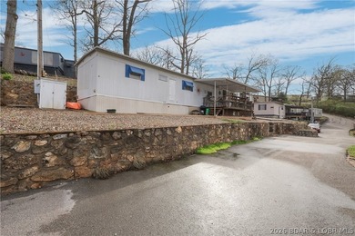 Here is a vacation home steps from the water with a nice view of - photo 12