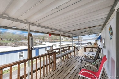 Here is a vacation home steps from the water with a nice view of - photo 17