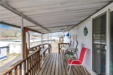 Here is a vacation home steps from the water with a nice view of - photo 18