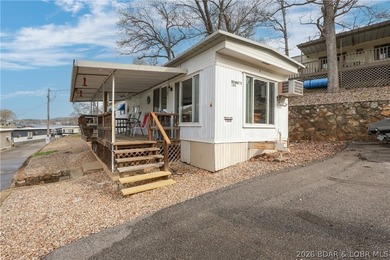 Here is a vacation home steps from the water with a nice view of - photo 19