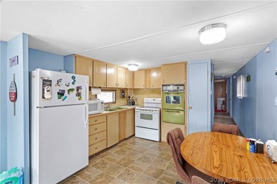 Here is a vacation home steps from the water with a nice view of - photo 28